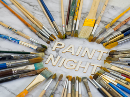 The words Paint Night surrounded by paint brushes